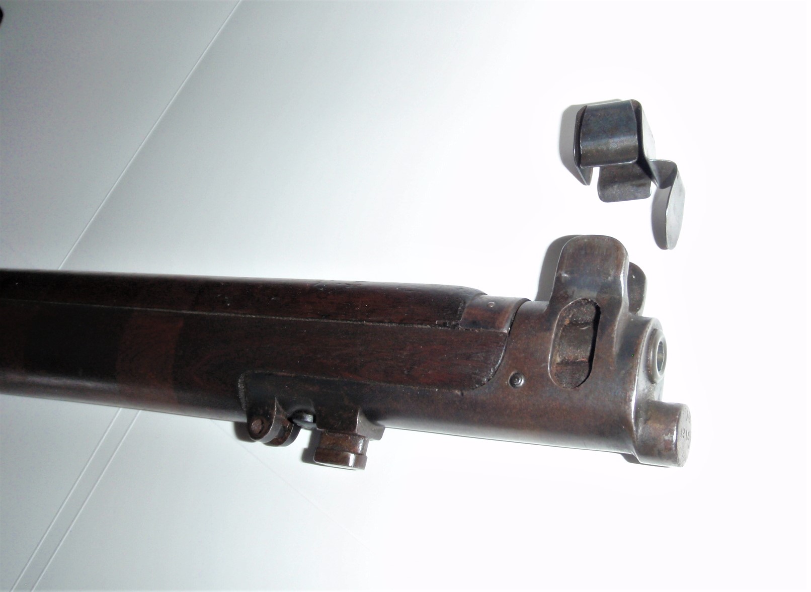 Muzzle cap with Bayonet boss and slide. Above is a foresight protector with muzzle cover.